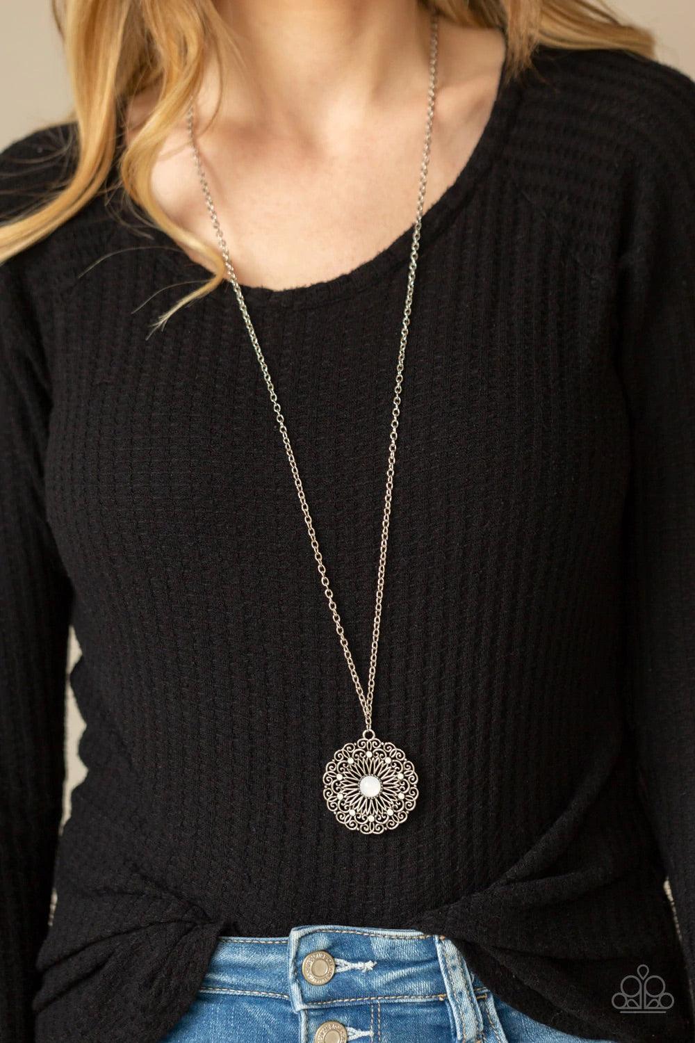 Paparazzi Accessories Opal Gardens - White Dotted in dainty opalescent beads, stacks of whimsical silver petals bloom from an opal beaded center, creating a decorative floral pendant at the bottom of a lengthened silver chain. Features an adjustable clasp