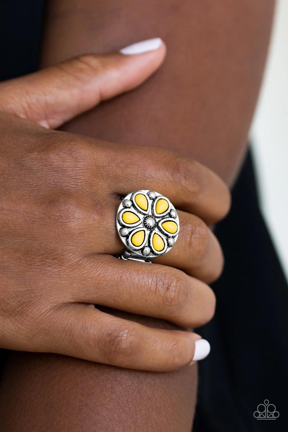 Paparazzi Accessories Color Me Calla Lily - Yellow Sunny yellow beads are pressed into a studded silver frame, creating a colorful floral centerpiece atop the finger. Features a stretchy band for a flexible fit. Sold as one individual ring. Jewelry