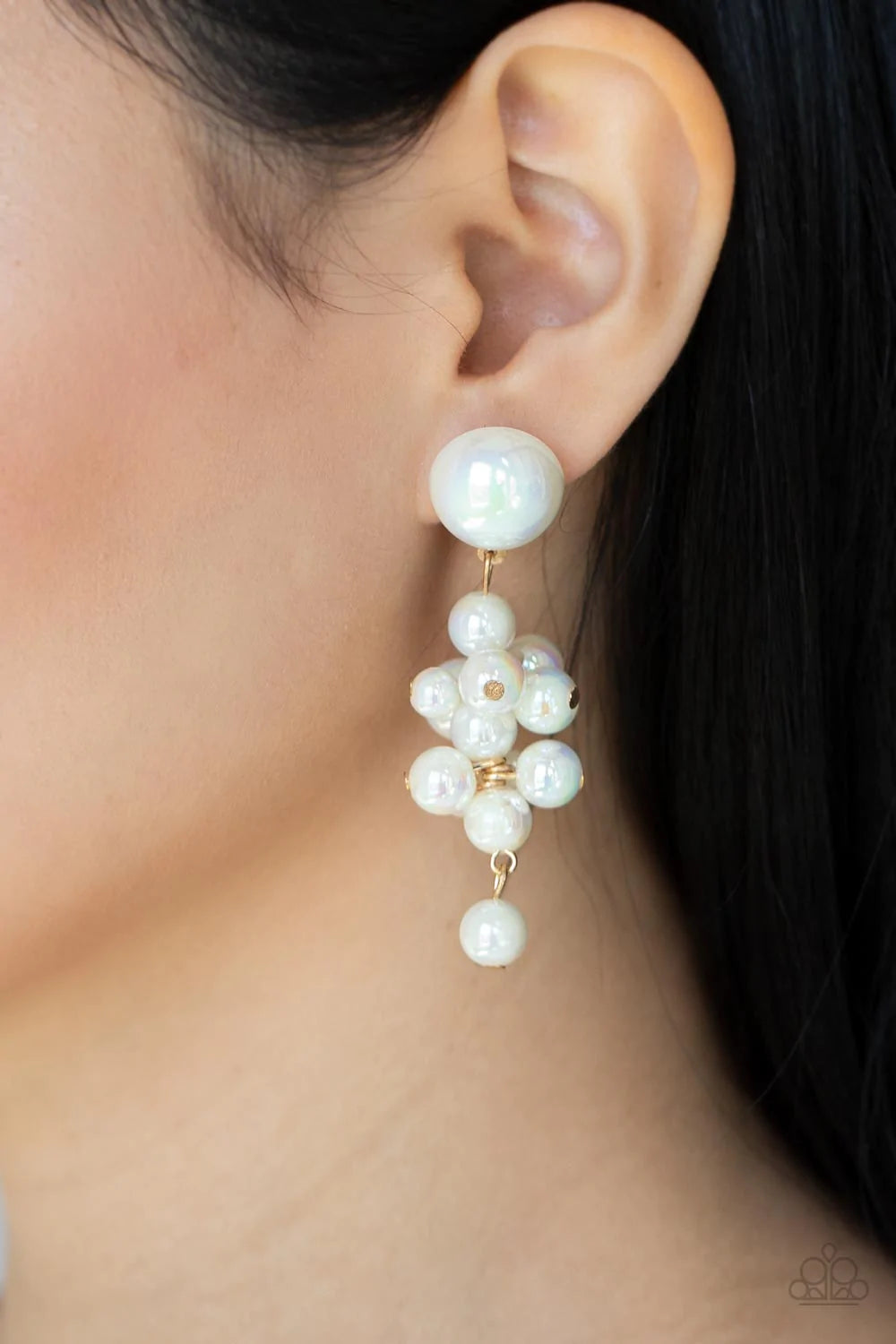 Paparazzi Accessories Don’t Rock The Yacht - Gold Featuring an iridescent shimmer, a bubbly collection of white pearls delicately cluster at the bottom of a matching half pearl fitting for an effervescently flirty look. Earring attaches to a standard post