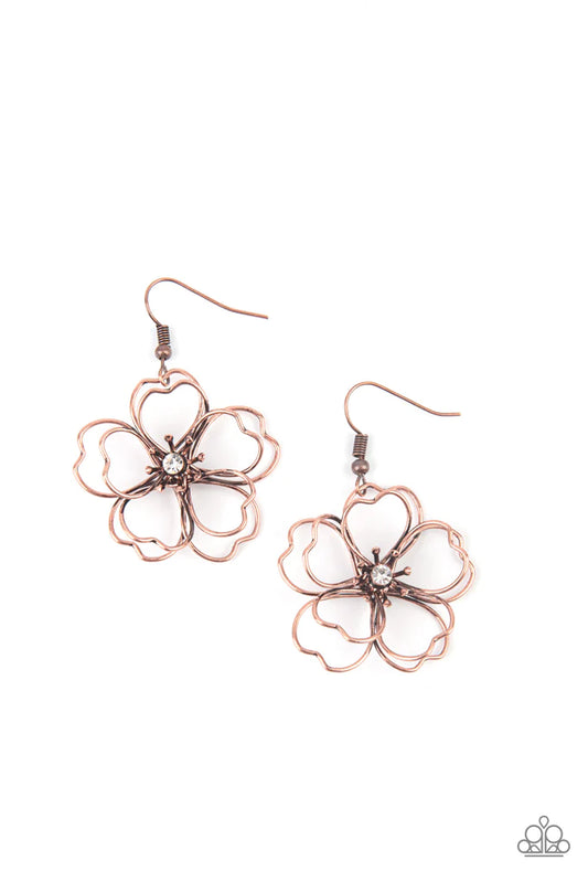 Paparazzi Accessories Petal Power - Copper Layers of heart-shaped petals molded from antiqued copper wire create an airy three-dimensional flower. A dainty white rhinestone dots the center adding sparkle to the whimsical frame. Earring attaches to a stand
