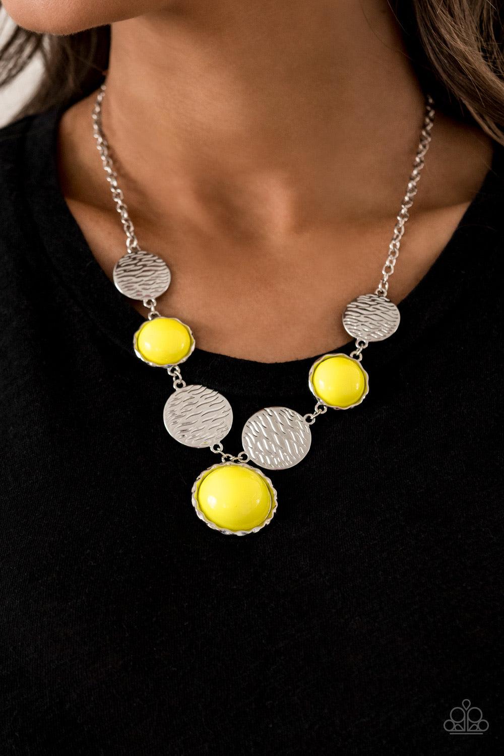 Paparazzi Accessories Bohemian Bombshell - Yellow Embossed in wavy textures, shiny silver discs link with bubbly yellow beaded frames below the collar, creating a colorful statement piece. Features an adjustable clasp closure. Jewelry
