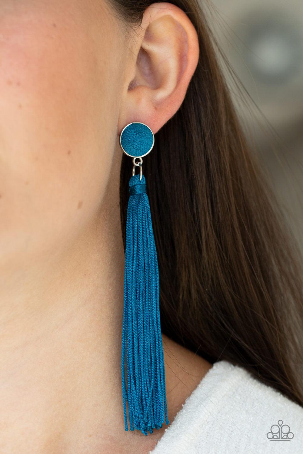 Paparazzi Accessories Tight Rope Tassel - Blue A tassel of shiny blue cording swings from the bottom of a matching blue threaded button-top frame for a flirtatious fashion. Earring attaches to a standard post fitting. Jewelry