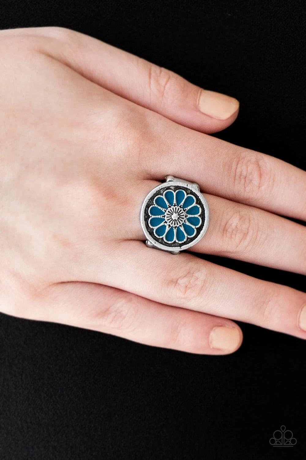 Paparazzi Accessories Garden View - Blue Brushed in an antiqued shimmer, refreshing blue petals spin into a whimsical floral pattern atop the finger. Features a stretchy band for a flexible fit. Sold as one individual ring. Jewelry
