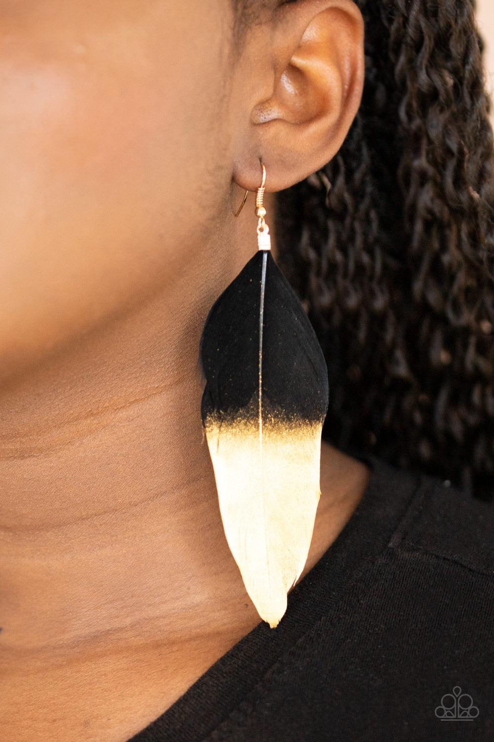 Paparazzi Accessories Fleek Feathers - Black Dipped in a golden shimmer, a soft black feather fans from the ear in a statement-making fashion. Earring attaches to a standard fishhook fitting. Sold as one pair of earrings. Jewelry