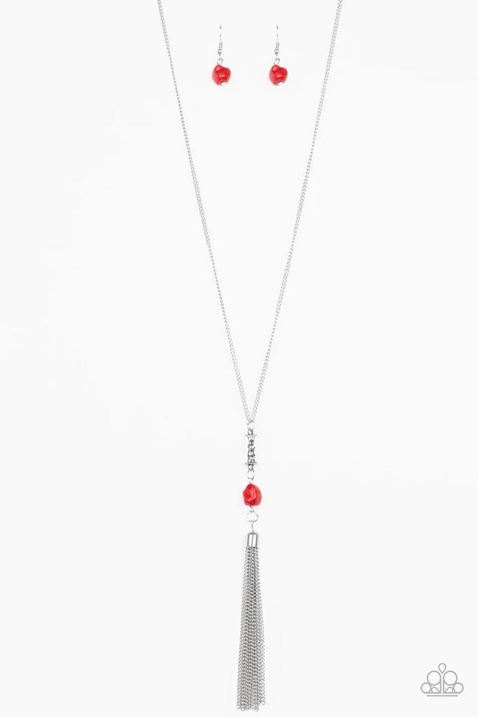 Paparazzi Accessories Wild Horse Wonder - Red Infused with a lengthened silver chain, a shimmery silver tassel swings from the bottom of a stacked red stone and hammered silver frame for a seasonal look. Features an adjustable clasp closure. Sold as one i