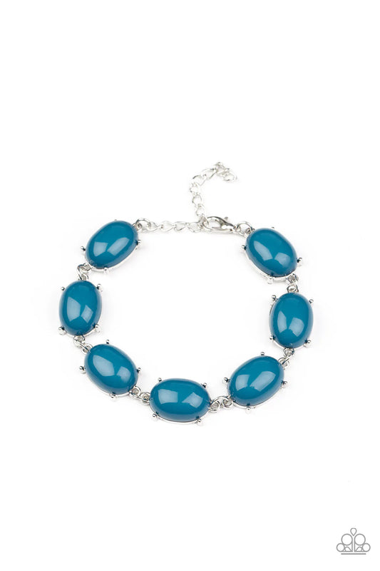 Paparazzi Accessories Confidently Colorful - Blue Featuring pronged silver fittings, an oversized collection of oval Mykonos Blue beads delicately link around the wrist for a dramatic pop of color. Features an adjustable clasp closure. Sold as one individ