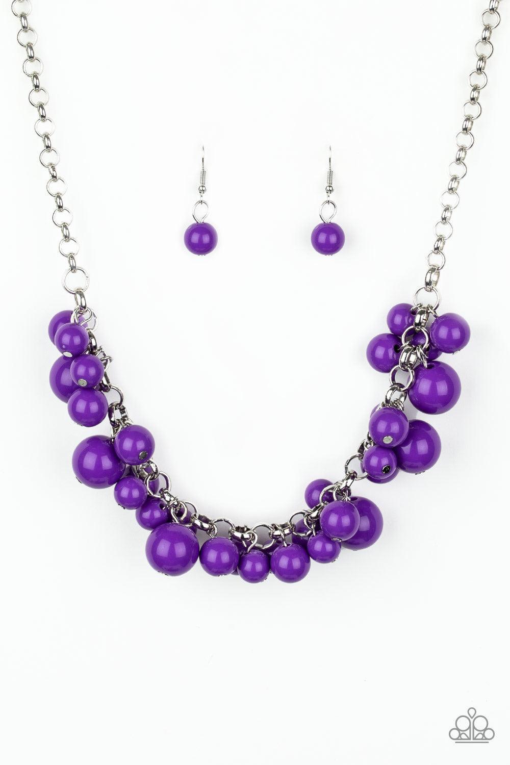 Paparazzi Accessories Walk This Broadway - Purple A collection of bubbly purple beads swing from the bottom of a shimmery silver chain, creating a vivacious fringe below the collar. Features an adjustable clasp closure. Sold as one individual necklace. In