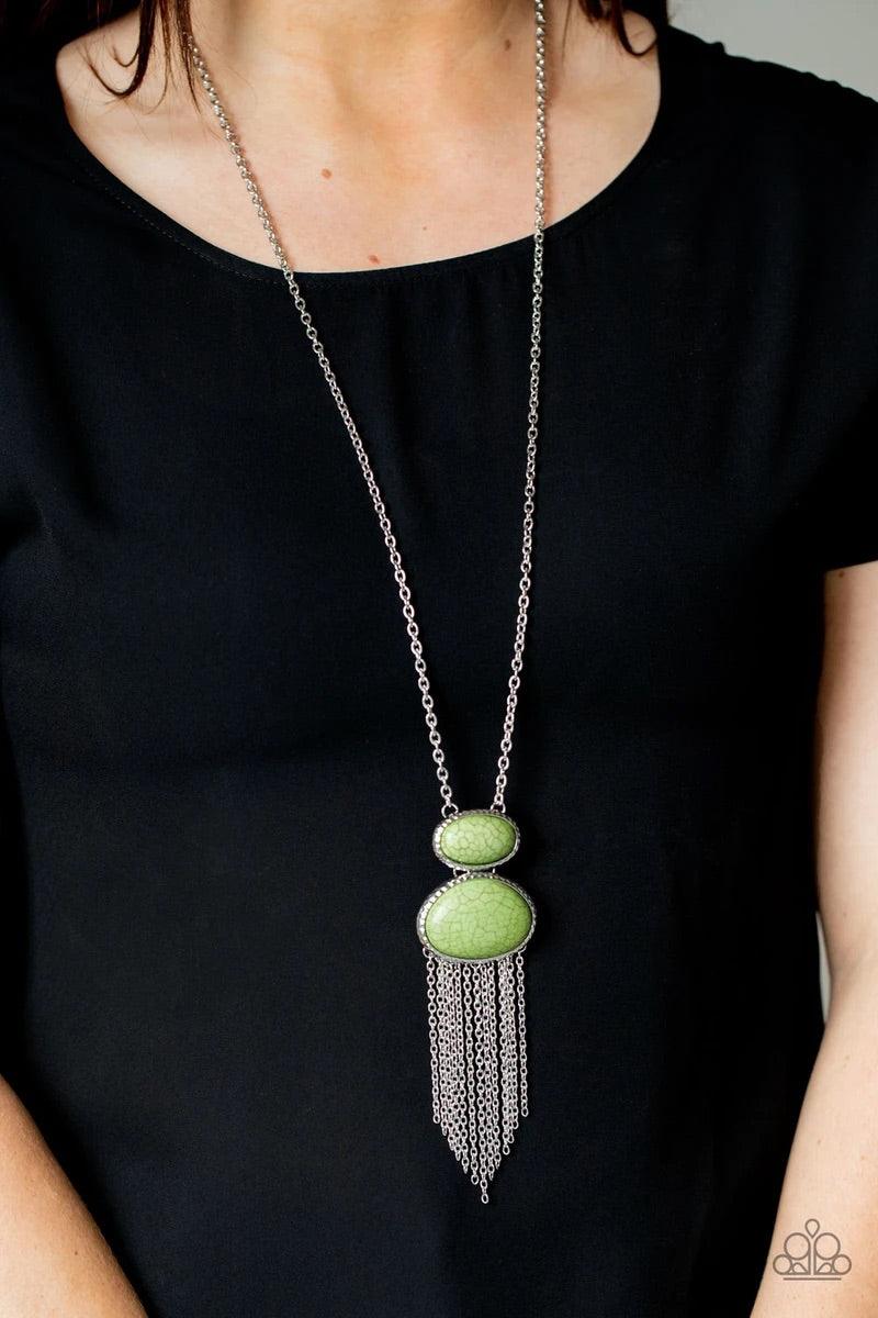 Paparazzi Accessories Meet Me At Sunset - Green A set of oversized oval green stones, encased in hammered silver frames, are linked one upon the other, calling attention to their bold mood. A fringe of silver chain sways below the set on a lengthened silv
