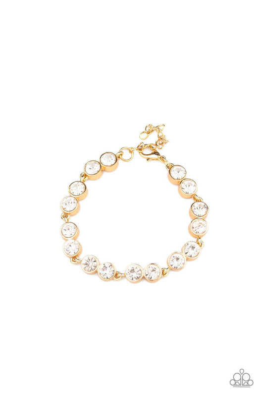 Paparazzi Accessories By All Means - Gold Encased in sleek gold frames, pairs of glittery white rhinestones link around the wrist for a timeless look. Features an adjustable clasp closure Jewelry