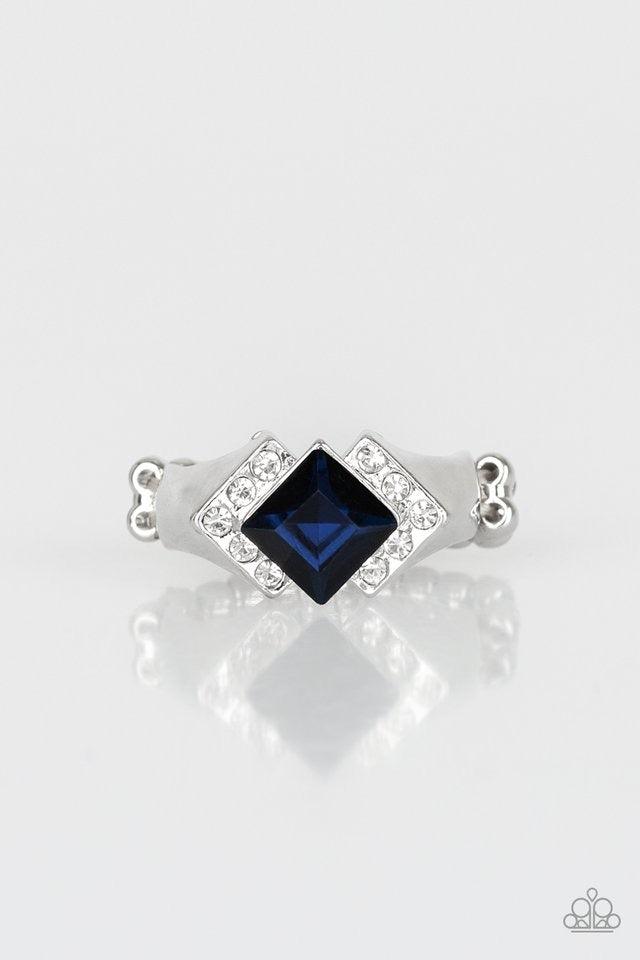 Paparazzi Accessories Wall Street Winner - Blue Featuring a regal square cut, a glittery blue rhinestone sits atop a bold silver band dusted in sparkling white rhinestones for a refined flair. Features a dainty stretchy band for a flexible fit. Jewelry