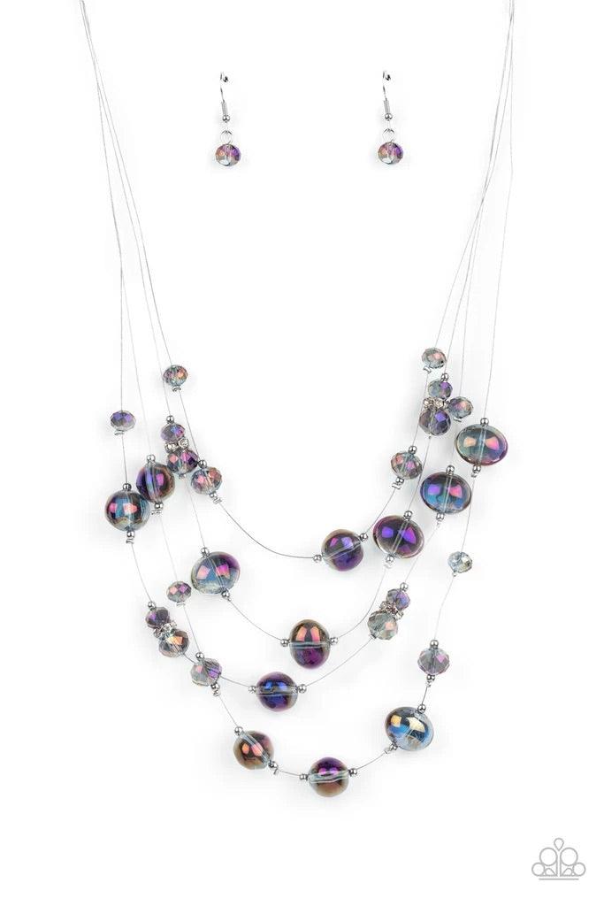 Paparazzi Accessories Cosmic Real Estate - Multi Featuring an oil spill finish, glassy beads and faceted crystal-like accents are fitted in place along dainty wires, creating the illusion of floating layers below the collar. Dainty silver beads and white