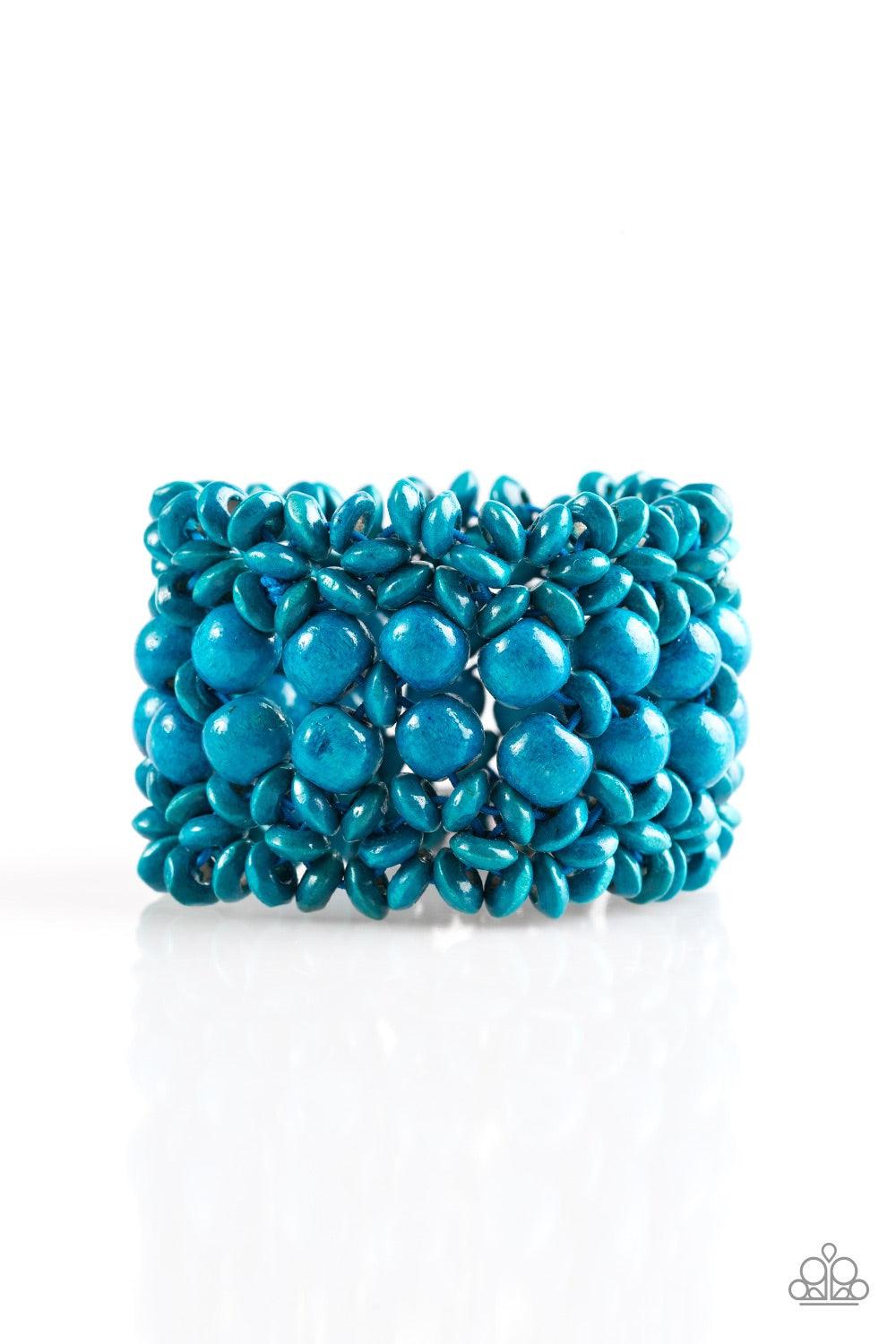 Paparazzi Accessories Tropical Bliss - Blue Blue wooden accents are threaded along elastic stretchy bands, creating an ornate bracelet. Rounded blue wooden beads line the center of the summery pattern for a bold finish. Jewelry