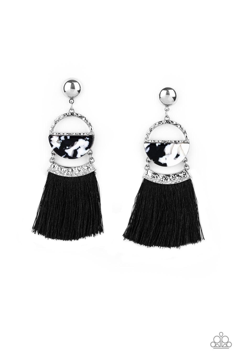 Paparazzi Accessories Tassel Trot - Black A shimmery silver stud links with a hammered silver frame featuring a faux marble acrylic accent. Featuring a hammered silver fitting, a shiny black threaded tassel attaches to the bottom of the retro lure for a f