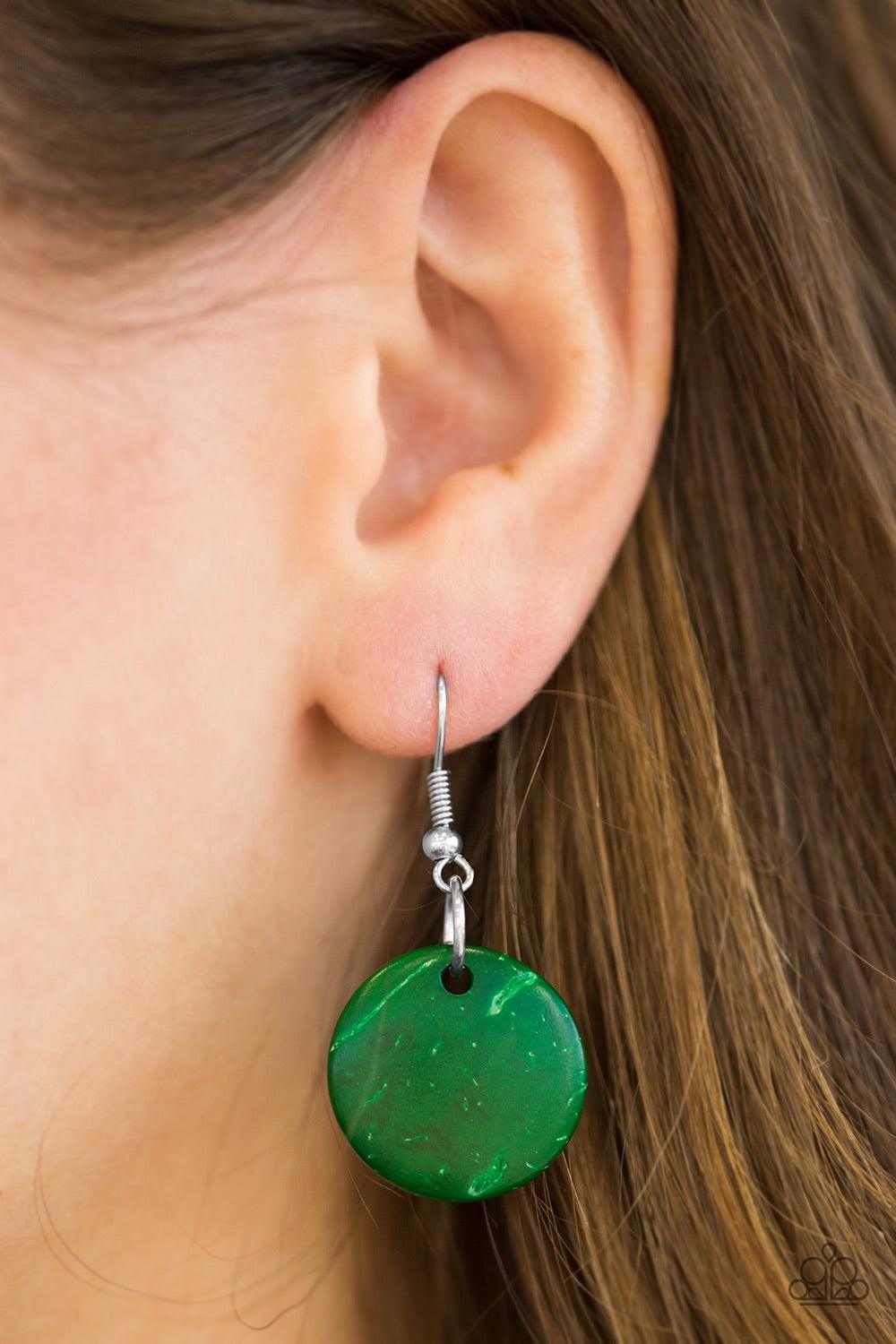 Paparazzi Accessories Bermuda Belle - Green Brushed in a refreshing green finish, wooden rings and beads are knotted in place along three strands, creating summery layers down the chest. Features a button loop closure. Jewelry