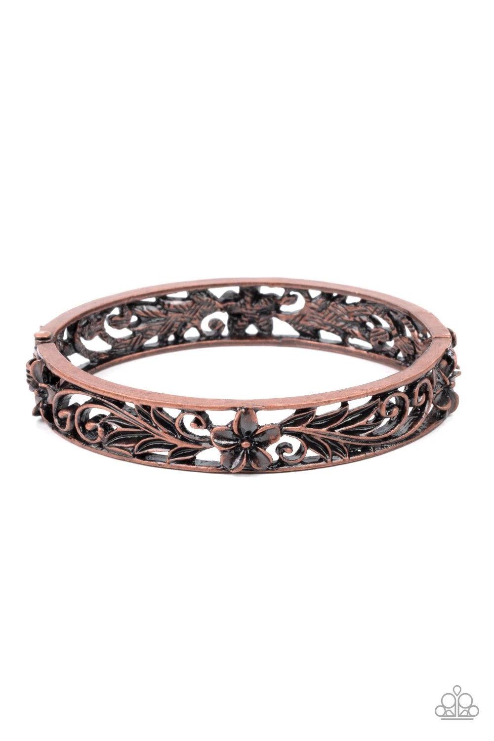 Paparazzi Accessories Hawaiian Essence - Copper Filled with leafy tropical floral filigree, two antiqued copper frames connect into a whimsical bangle-like cuff around the wrist. Features a hinged closure.Sold as one individual bracelet. Jewelry