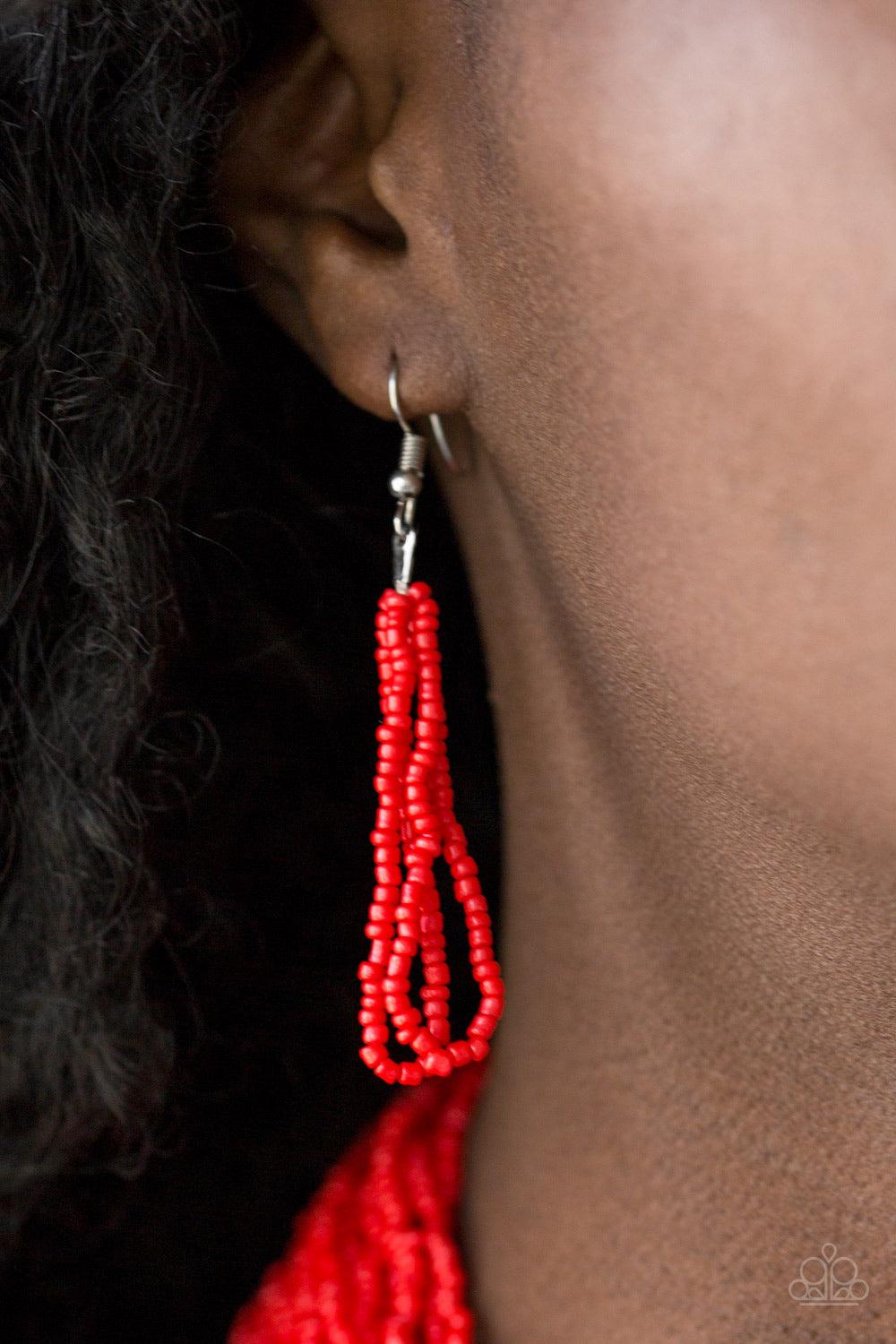 Paparazzi Accessories The Show Must CONGO On! - Red Infused with two bold silver fittings, countless strands of fiery red seed beads drape below the collar for a seasonal look. Features an adjustable clasp closure. Sold as one individual necklace. Include