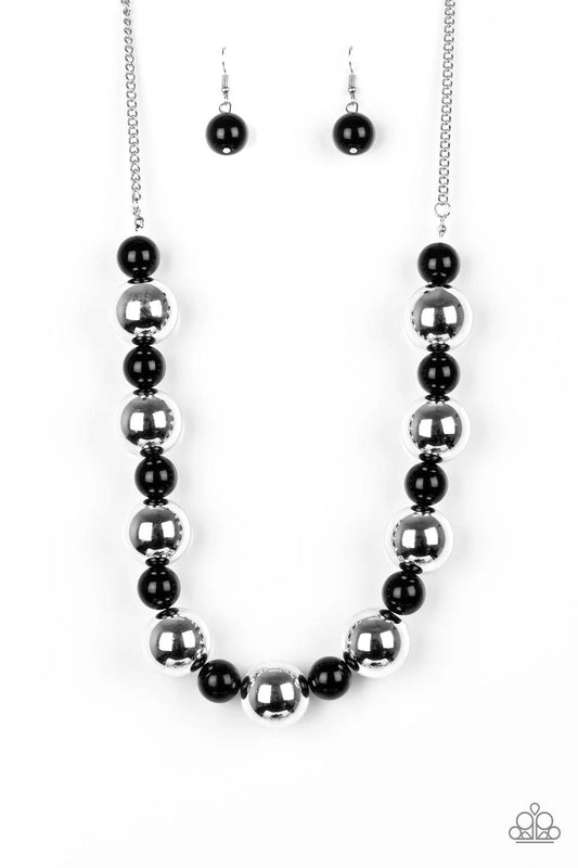 Paparazzi Accessories Top Pop - Black Polished black beads and dramatic silver beads drape below the collar for a perfect pop of color. Features an adjustable clasp closure. Sold as one individual necklace. Includes one pair of matching earrings. Jewelry