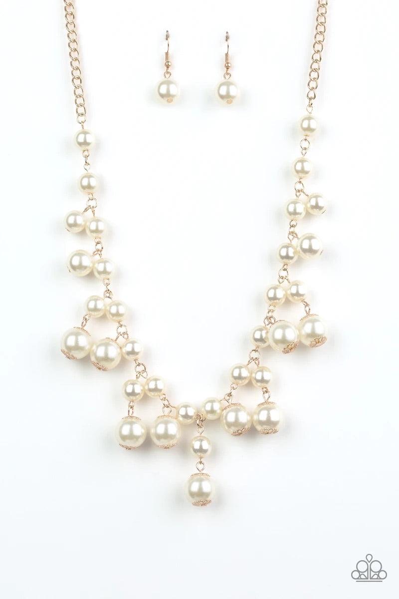Paparazzi Accessories Soon To Be Mrs - Gold Varying in size, bubbly white pearls swing from the bottom of a classic strand of pearls, creating a refined fringe below the collar. Features an adjustable clasp closure. Sold as one individual necklace. Includ