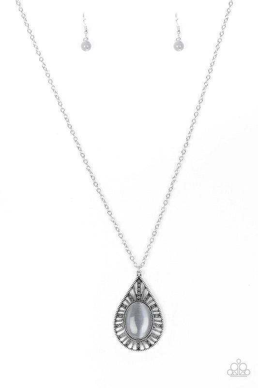 Paparazzi Accessories Total Tranquility - Silver A smoky moonstone is pressed into an ornate teardrop frame radiating with floral detail. The dramatic pendant swings from the bottom of a lengthened silver chain for a whimsical finish. Features an adjustab