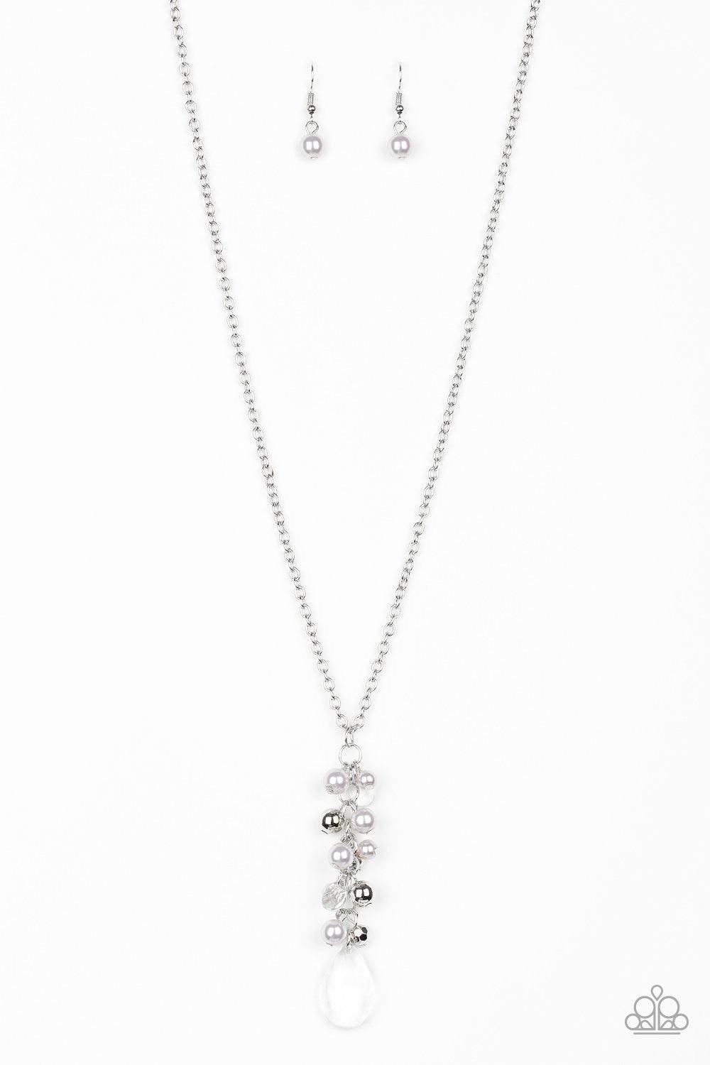 Paparazzi Accessories Teardrop Serenity - Silver A collection of gray pearls, shiny silver beads, and glassy white teardrops trickle along an extended chain that swings from the bottom of a classic silver chain. An over sized teardrop swings from the bott