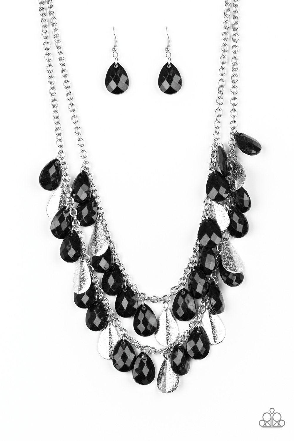 Paparazzi Accessories Life of the FIESTA - Black Two strands of silver chain are decorated in a flirtatious fringe of faceted black teardrops. Glittery beveled silver teardrops are sprinkled between the black beading, adding hints of shimmer to the vibran