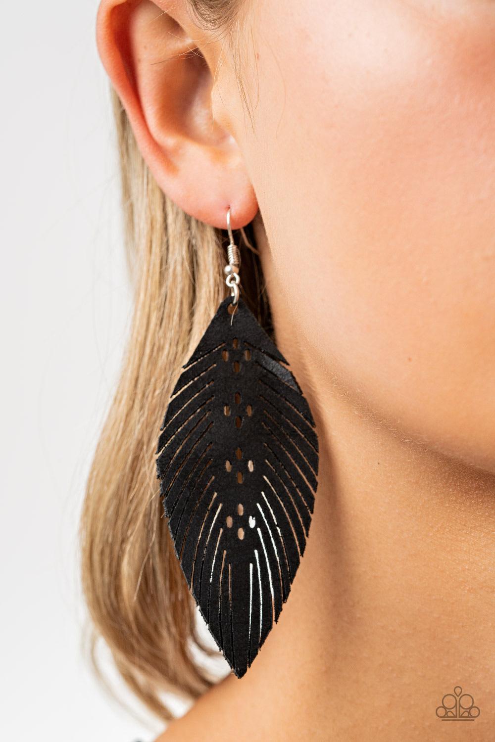 Paparazzi Accessories Wherever The Wind Takes Me - Black Spliced and stenciled in whimsical detail, a distressed black leather frame is cut into a feathery frame for a free-spirited finish. Earring attaches to a standard fishhook fitting. Sold as one pair