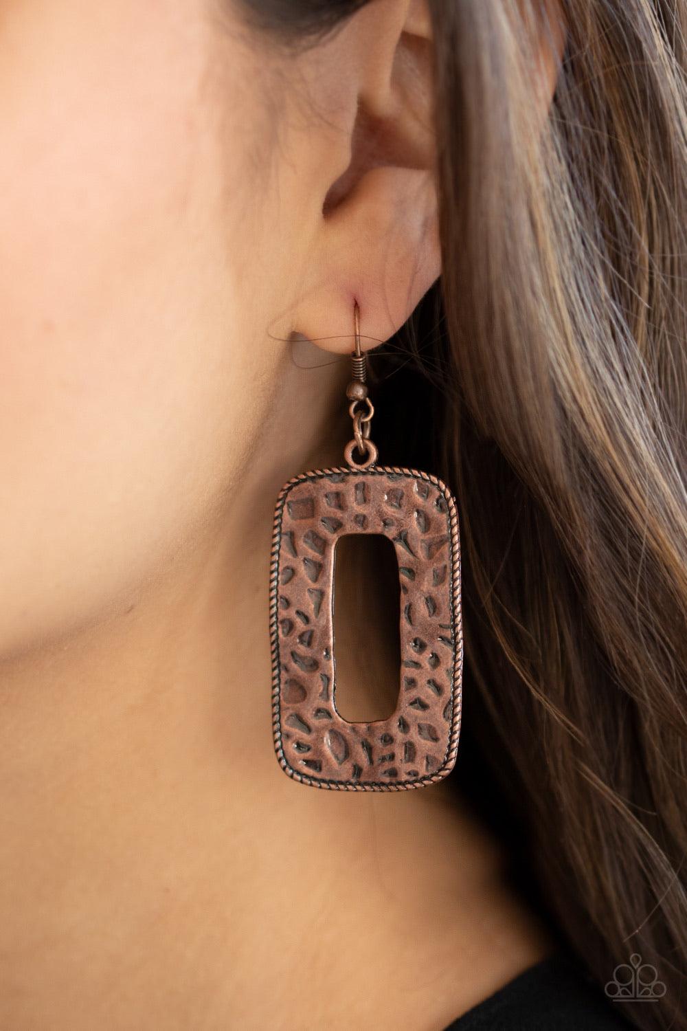 Paparazzi Accessories Primal Elements - Copper Bordered in metallic rope-like details, a copper rectangular frame has been hammered in antiqued textures for a rustically radiant look. Earring attaches to a standard fishhook fitting. Sold as one pair of ea