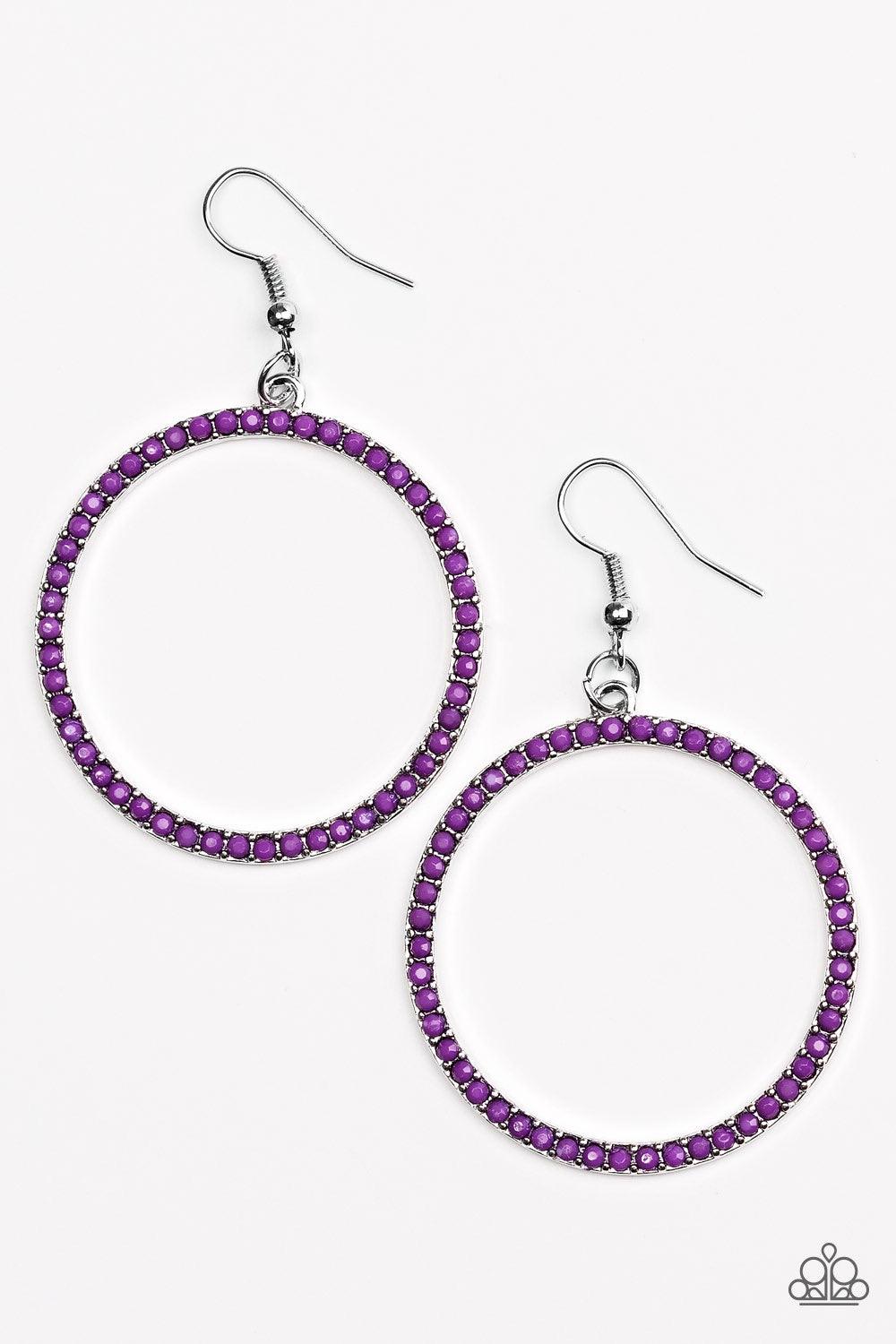 Paparazzi Accessories Spring Party - Purple Dainty purple beads are encrusted along a shimmery silver hoop for a perfect pop of seasonal color. Earring attaches to a standard fishhook fitting. Jewelry