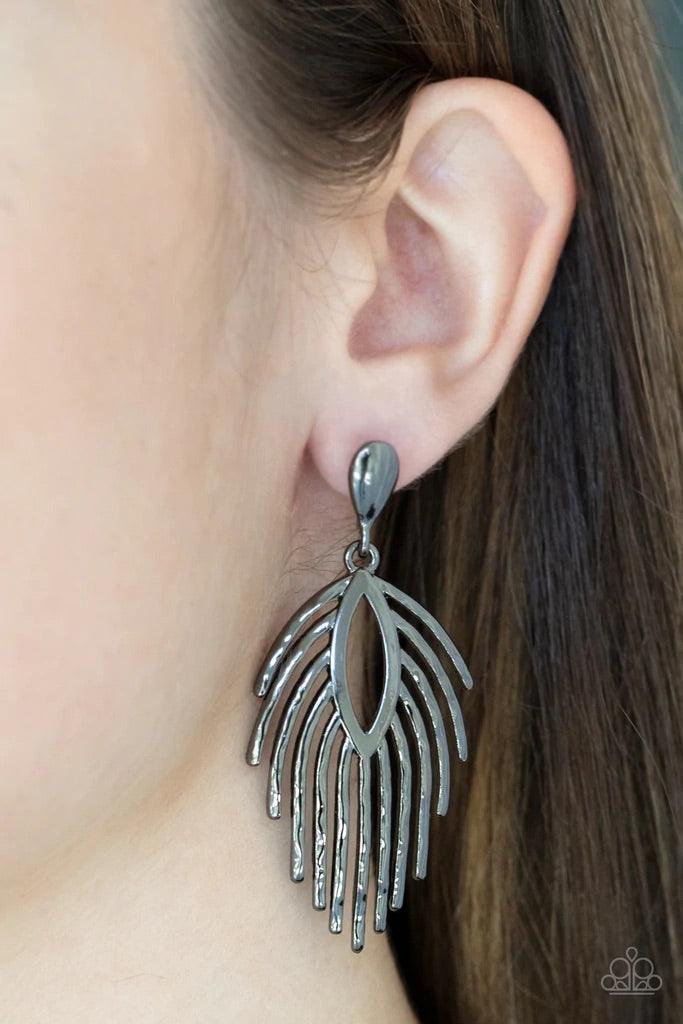 Paparazzi Accessories Metro Safari - Black Anchored by a solid gunmetal bulb, gunmetal bars flare out and fall like shooting stars from an open marquise frame creating a captivating allure. Earring attaches to a standard post fitting. Sold as one pair of
