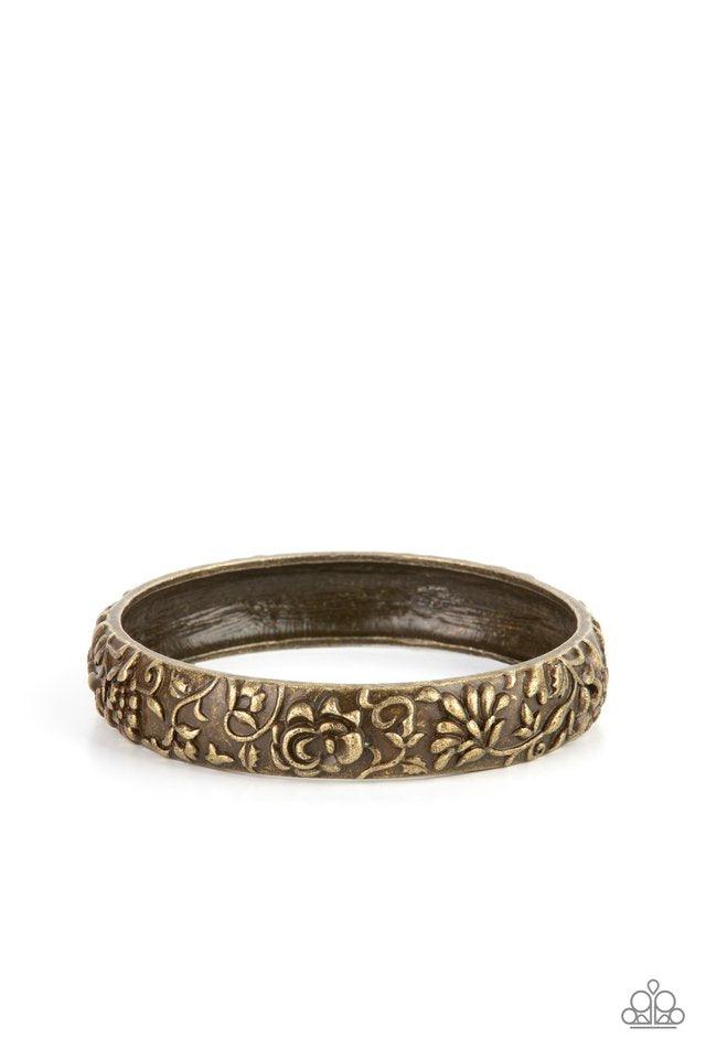 Paparazzi Accessories Victorian Meadow - Brass An antiqued brass bangle is delicately embossed in rustic floral patterns, creating a vintage inspired look around the wrist. Sold as one individual bracelet. Jewelry