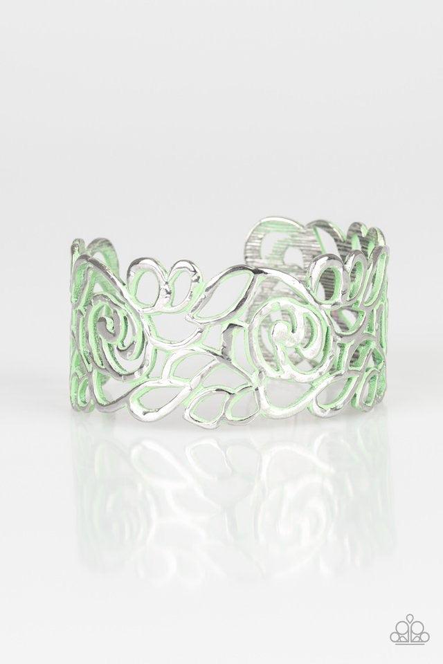 Paparazzi Accessories Victorian Gardens - Green Brushed in a distressed green finish, floral filigree curls across the wrist, coalescing into a colorful cuff. Sold as one individual bracelet. Jewelry