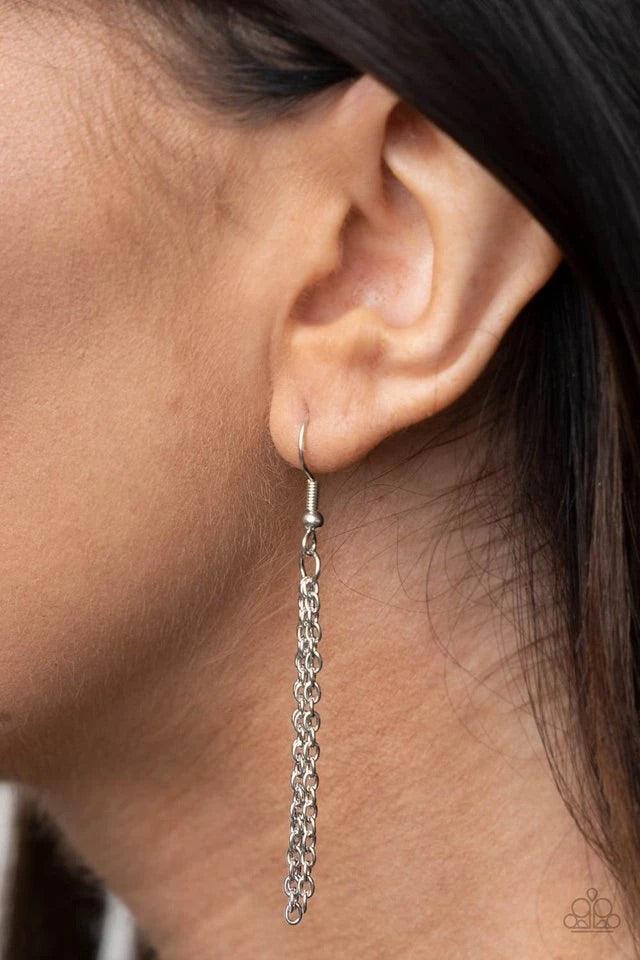 Paparazzi Accessories The Cool Mom - Silver A dainty heart engraved next to the word "Mom" on a shiny silver disc creates a sweet memento as it falls below the collar. Features an adjustable clasp closure. Jewelry