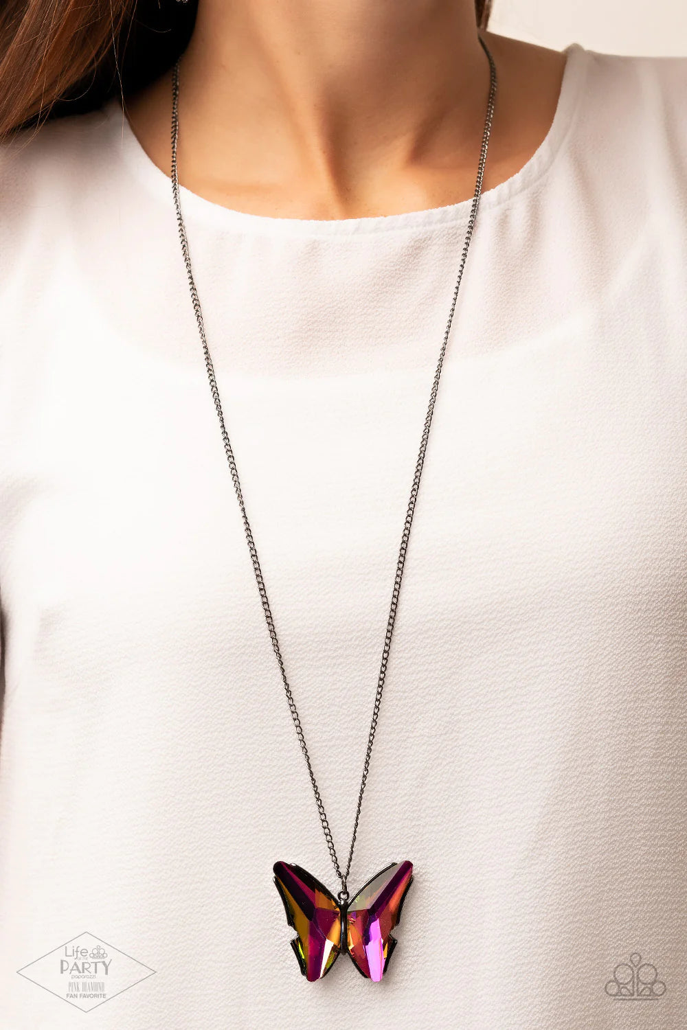 Paparazzi Accessories The Social Butterfly Effect - Multi 2 Featuring a stunning oil spill finish, dramatically faceted gems adorn the wings of a gunmetal butterfly, creating an ethereal pendant at the bottom of a lengthened gunmetal chain. Features an ad