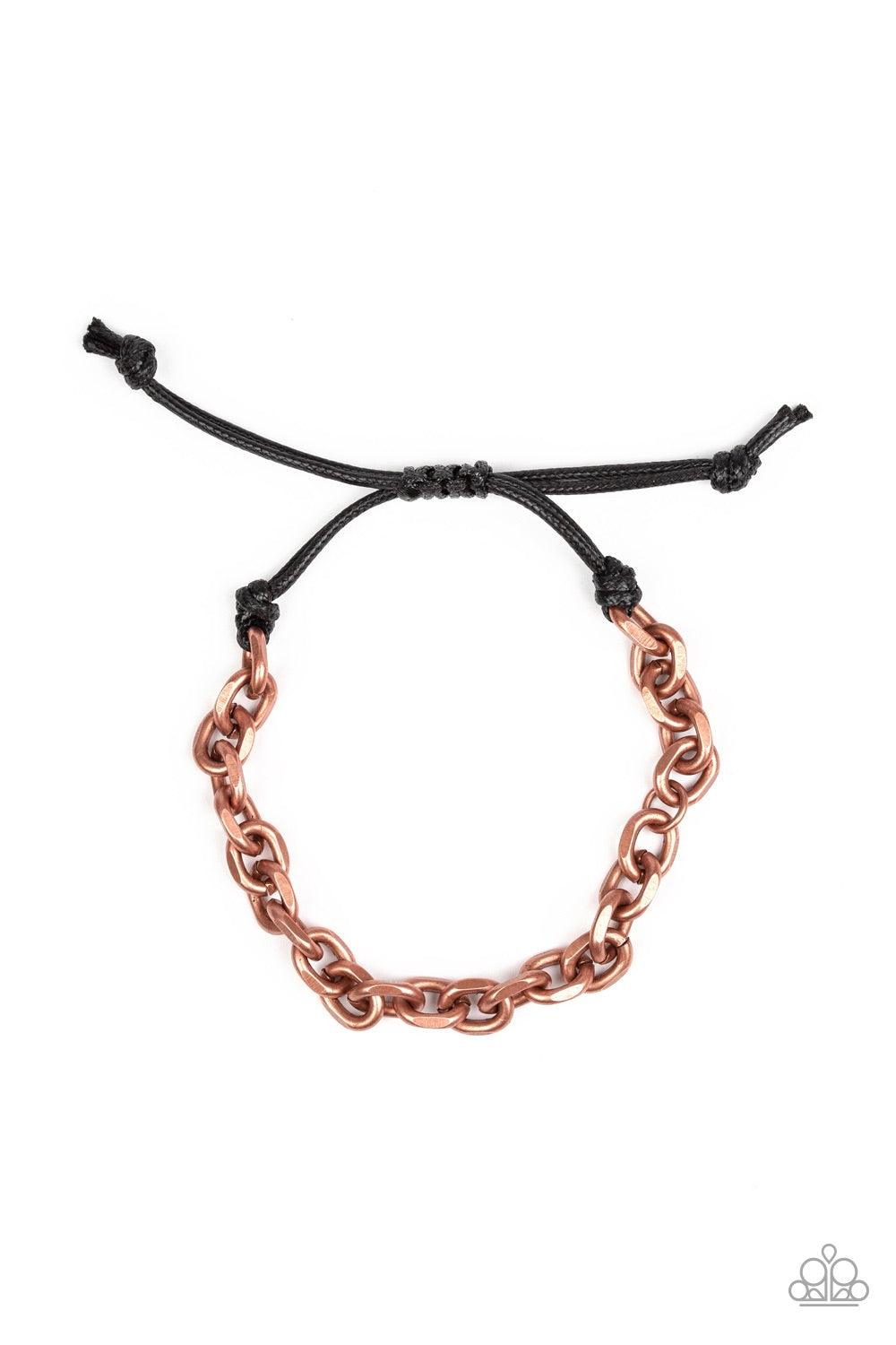 Paparazzi Accessories Rumble - Copper Shiny black cording knots around the ends of a copper beveled cable chain that is wrapped across the top of the wrist for a versatile look. Features an adjustable sliding knot closure. Jewelry