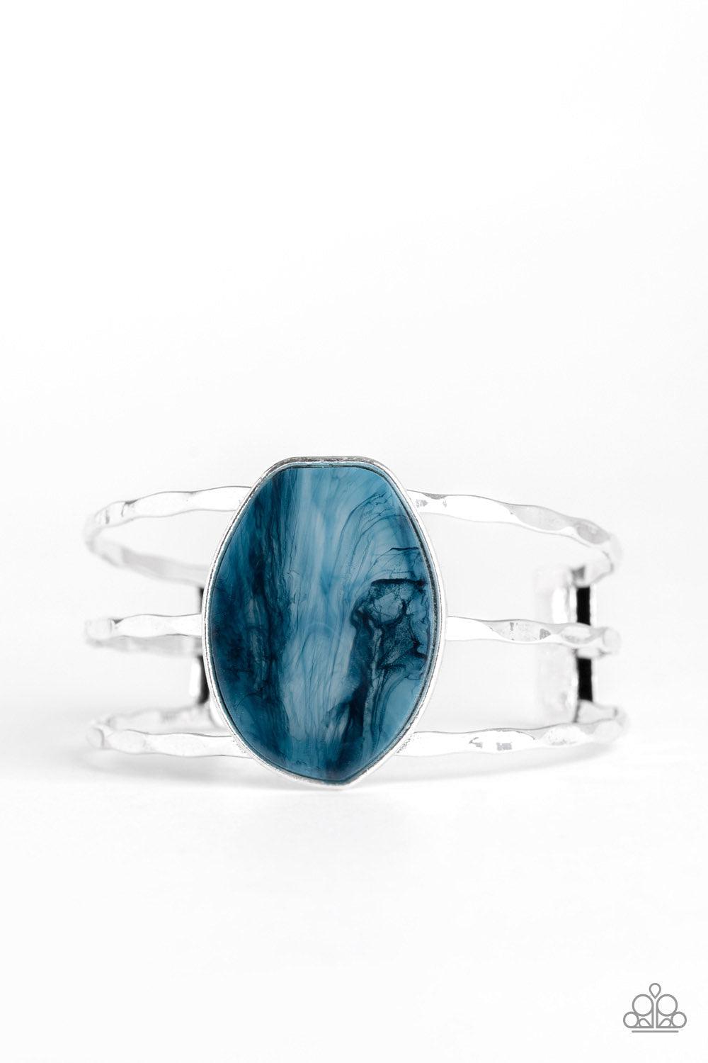 Paparazzi Accessories Canyon Dream - Blue Featuring a faux rock finish, a refreshing blue acrylic piece sits atop a trio of hammered silver bars that coalesce into an airy cuff for an artisan inspired look. Color may vary. Jewelry