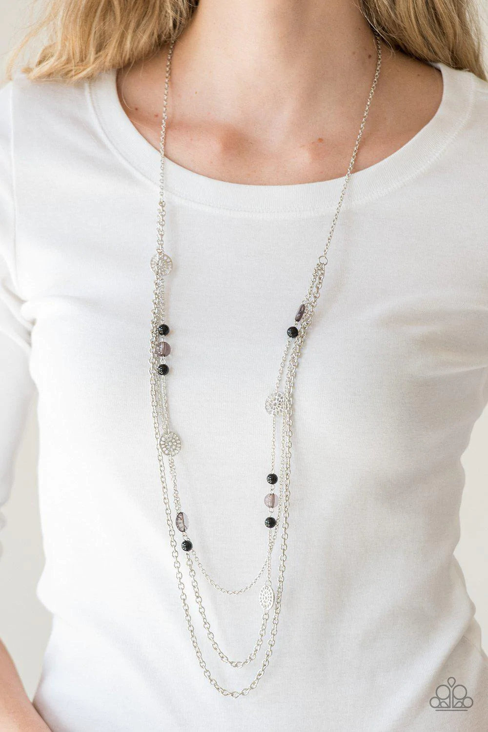 Paparazzi Accessories Pretty Pop-tastic! - Black Ornate silver accents, glassy beads, and polished black beads trickle along strands of shimmery silver chains for a whimsical look. Features an adjustable clasp closure. Sold as one individual necklace. Inc