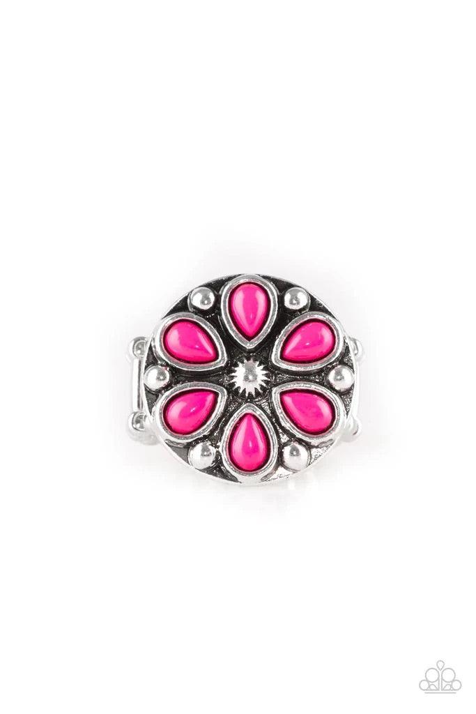 Paparazzi Accessories Color Me Calla Lily - Pink Vivacious pink beads are pressed into a studded silver frame, creating a colorful floral centerpiece atop the finger. Features a stretchy band for a flexible fit. Sold as one individual ring. Jewelry