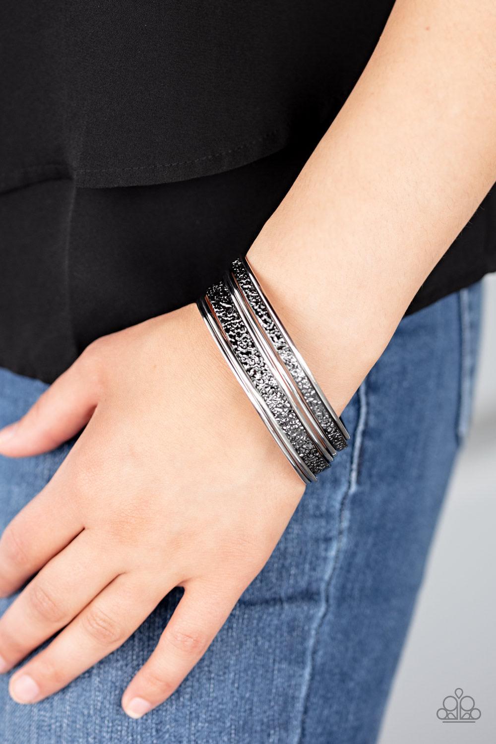 Paparazzi Accessories Full Circle - Multi Brushed in a high-sheen shimmer, a collection of smooth silver and heavily textured gunmetal bangles slides up and down the wrist for an edgy stacked look. Jewelry