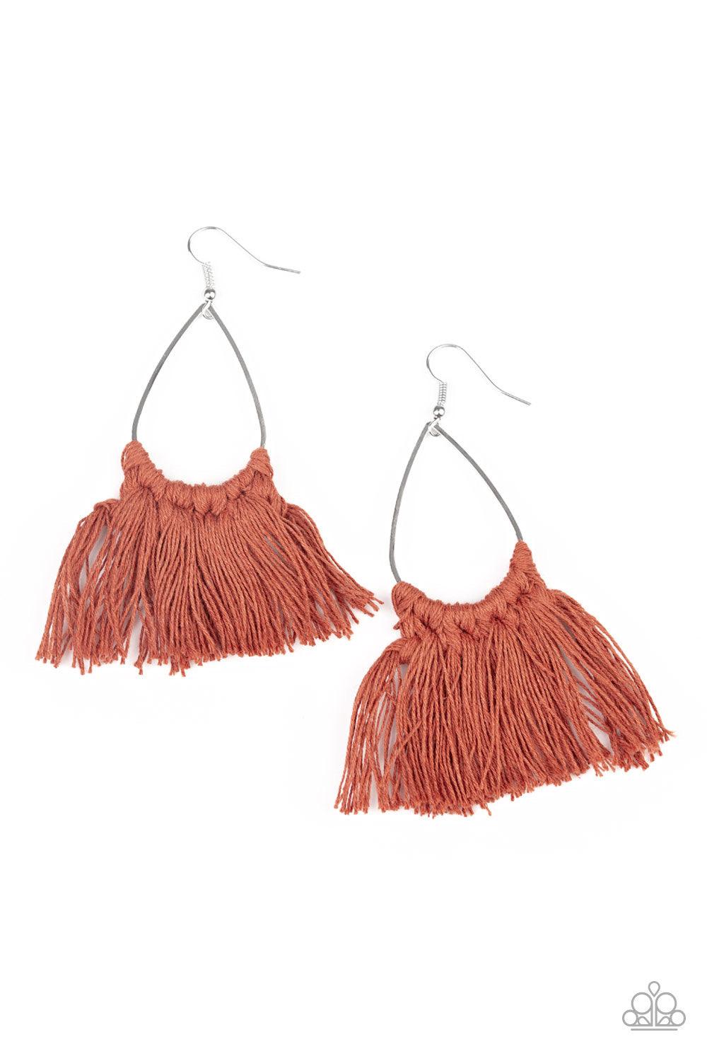 Paparazzi Accessories Tassel Treat - Brown Cinnamon Stick threaded tassels knot around the bottom of a shimmery silver teardrop frame, creating a spicy fringe. Earring attaches to a standard fishhook fitting. Jewelry