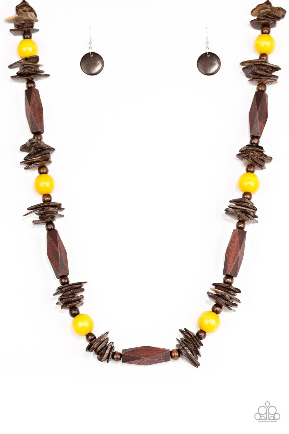 Paparazzi Accessories Cozumel Coast - Yellow Featuring round, faceted, and distressed finishes, mismatched brown wooden beads are threaded along shiny brown cording. Vivacious yellow wooden beads trickle between the earthy accents, adding a colorful finis