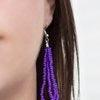 Paparazzi Accessories The Show Must CONGO On - Purple Infused with two bold silver fittings, countless strands of vivacious purple seed beads drape below the collar for a seasonal look. Features an adjustable clasp closure. Jewelry