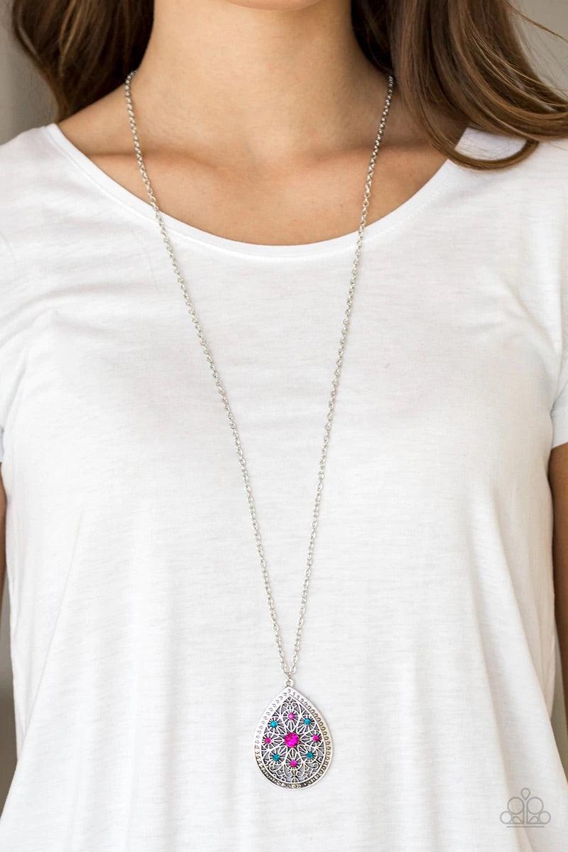 Paparazzi Accessories I Am Queen - Multi A dramatic teardrop pendant swings from the bottom of an elongated silver chain, elegantly slimming the torso. Glittery blue and pink rhinestones are sprinkled along the pendant as silver filigree dances across the