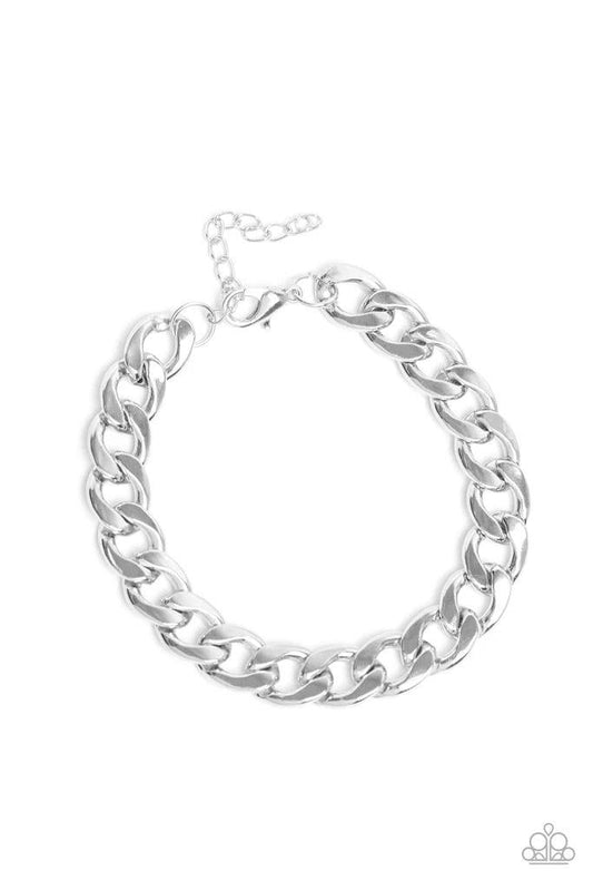 Paparazzi Accessories Leader Board - Silver A thick strand of silver curb link chain is wrapped around the wrist for a classic look. Features an adjustable clasp closure. Sold as one individual bracelet. Jewelry