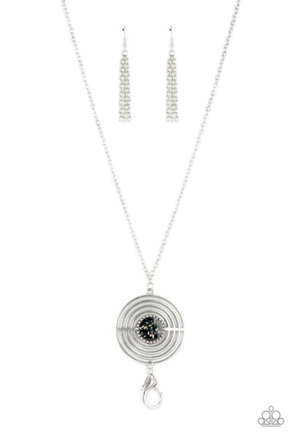 Paparazzi Accessories Targeted Tranquility - Black *Lanyard Flecked in iridescent shell-like accents, a studded black frame adorns the center of an oversized silver pendant rippling with concentric circles at the bottom of an extended silver chain for a d