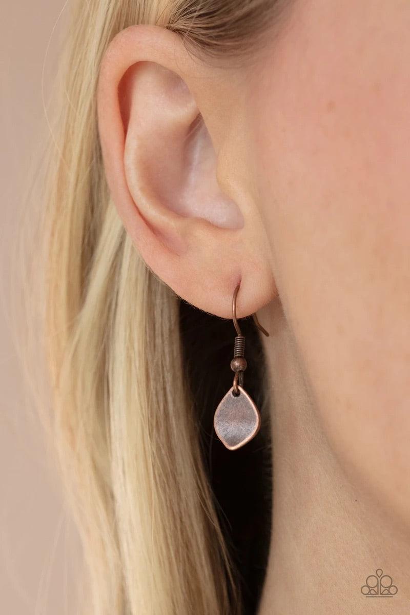 Paparazzi Accessories Dainty Discovery - Copper Teardrop copper discs drip from a dainty copper chain, creating a rustic fringe below the collar. Features an adjustable clasp closure. Sold as one individual necklace. Includes one pair of matching earrings