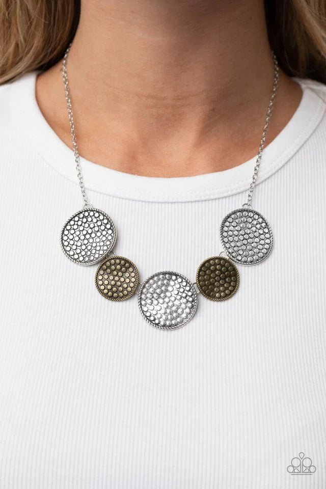 Paparazzi Accessories Self DISC-overy - Multi Embossed in a dotted motif, a rustic collection of warped silver and brass discs ruggedly links below the collar for an artisan inspired fashion. Features an adjustable clasp closure. Sold as one individual ne
