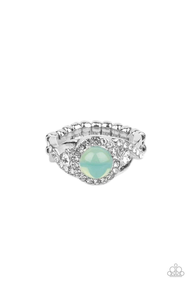 Paparazzi Accessories New Age Nirvana - Green An opal green bead is pressed into the center of a ring of white rhinestones that sits atop interwoven silver bars dotted in dainty white rhinestones, creating an ethereally elegant centerpiece atop the finger