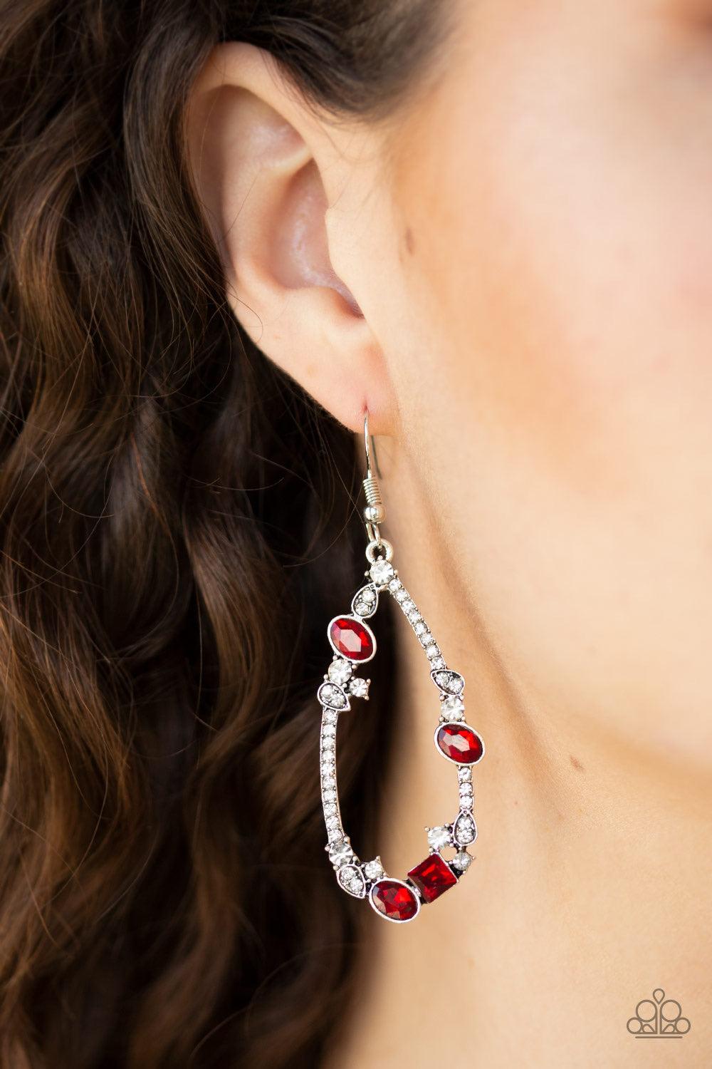 Paparazzi Accessories Quite The Collection - Red Varying in size and shape, a collection of glassy white and glittery red rhinestones are encrusted along an airy teardrop lure for an edgy-glamorous look. Earring attaches to a standard fishhook fitting. Je