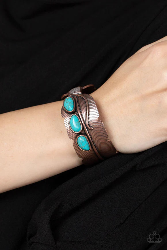 Paparazzi Accessories River Bend Relic - Copper A trio of asymmetrical turquoise stones embellishes the front of a lifelike textured copper feather that curls around the wrist, creating an authentic southwestern cuff. Sold as one individual bracelet. Jewe