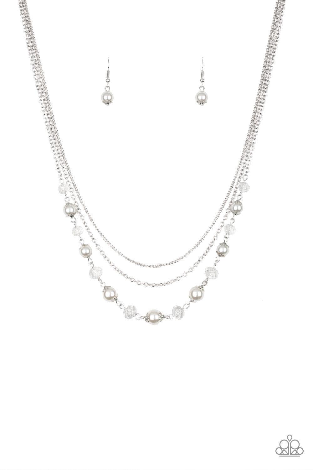 Paparazzi Accessories Tour De Demure - White Infused with two layers of dainty silver chains, pearly white and sparkling crystal-like beads link below the collar for a demure look. Features an adjustable clasp closure. Jewelry